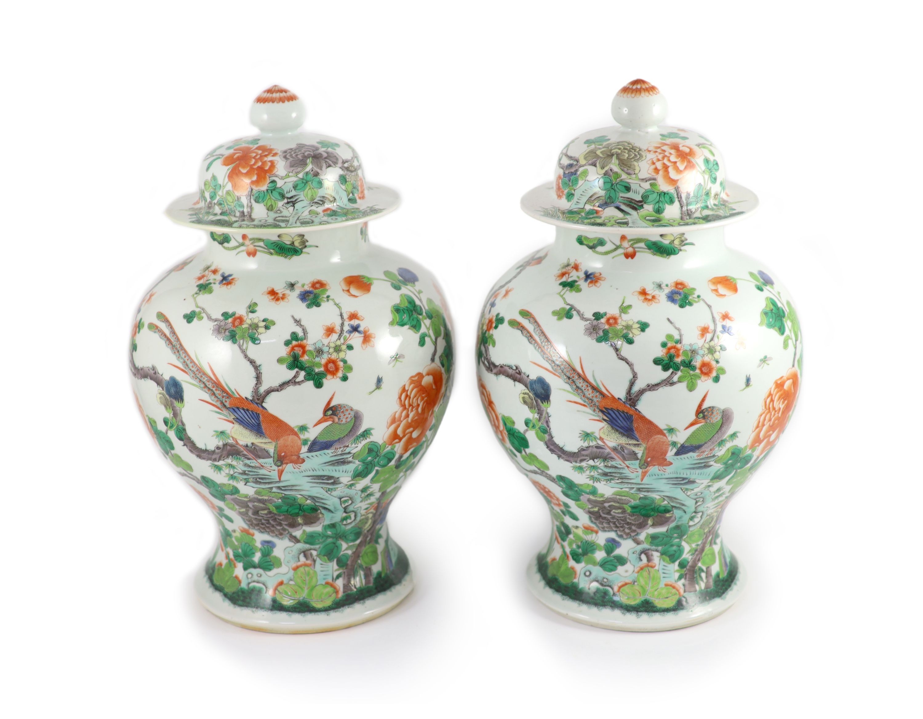A pair of large Chinese famille verte jars and covers, late 19th century, 45cm high, restoration